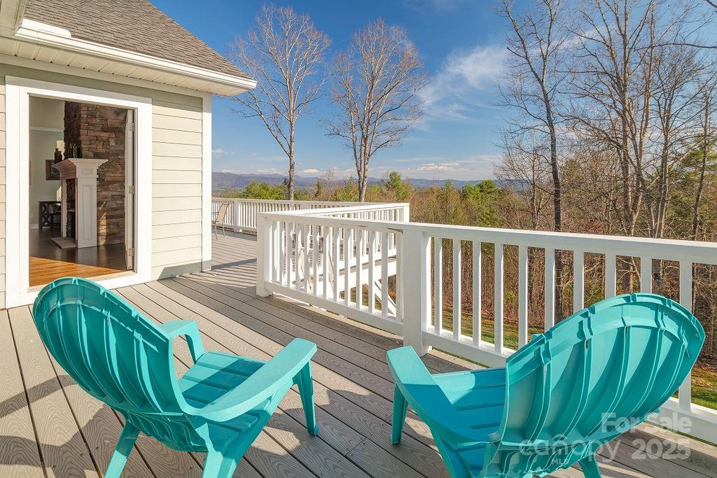 61 Buckle Ridge Weaverville, NC 28787 - Photo 33 of 42 a view of a two chairs in the deck