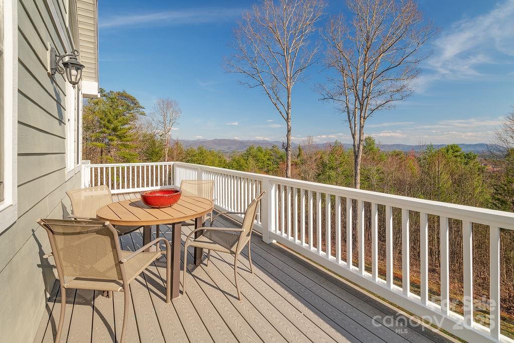 61 Buckle Ridge Weaverville, NC 28787 - Photo 34 of 42 a view of balcony with wooden floor and outdoor seating