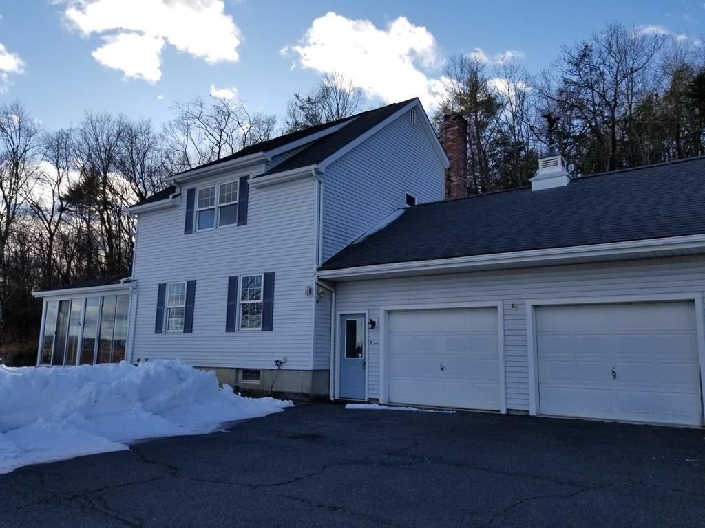 21 Linseed Road Northampton, MA 01060 - Photo 1 of 12 a house that has a tree in front of it