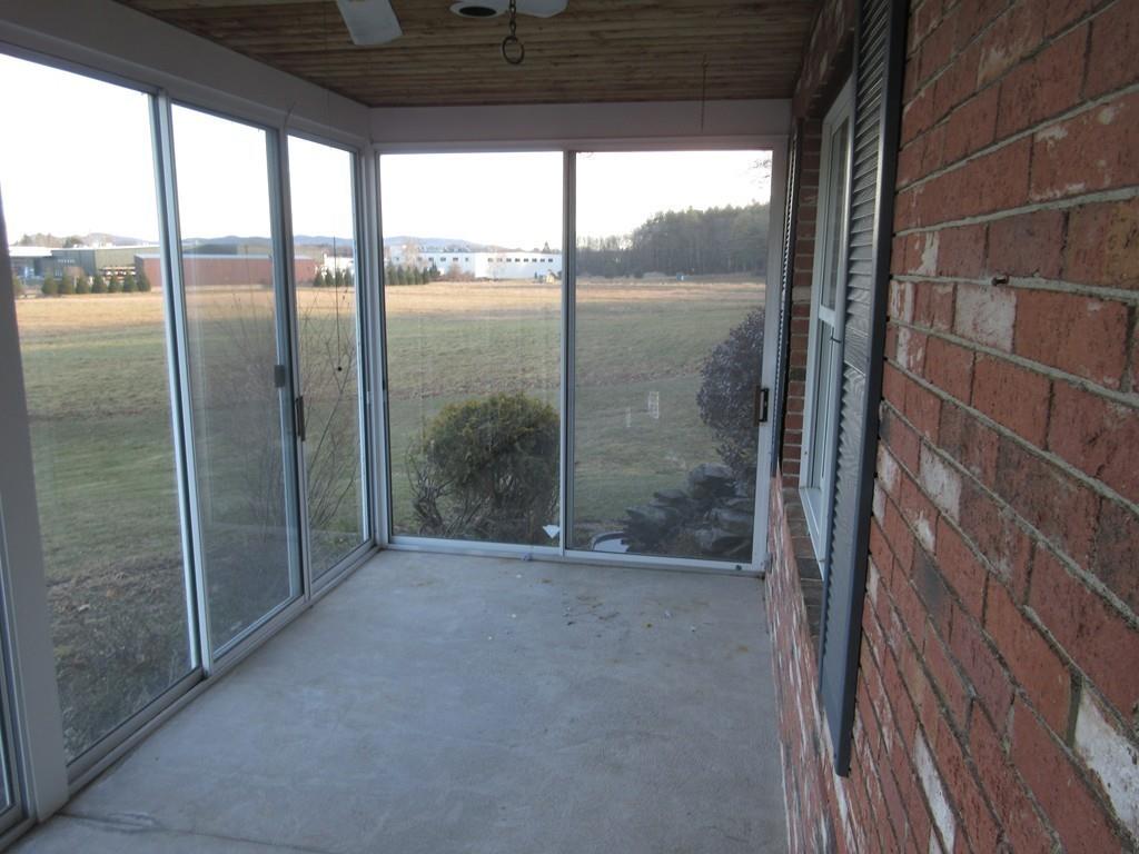 21 Linseed Road Northampton, MA 01060 - Photo 11 of 12 a view of a glass door and the balcony