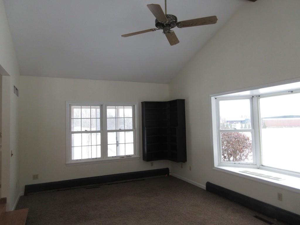 21 Linseed Road Northampton, MA 01060 - Photo 6 of 12 wooden floor in an empty room with a window