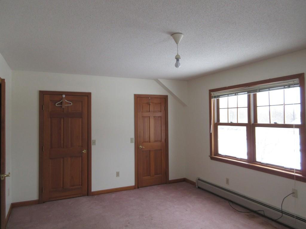 21 Linseed Road Northampton, MA 01060 - Photo 7 of 12 an empty room with windows