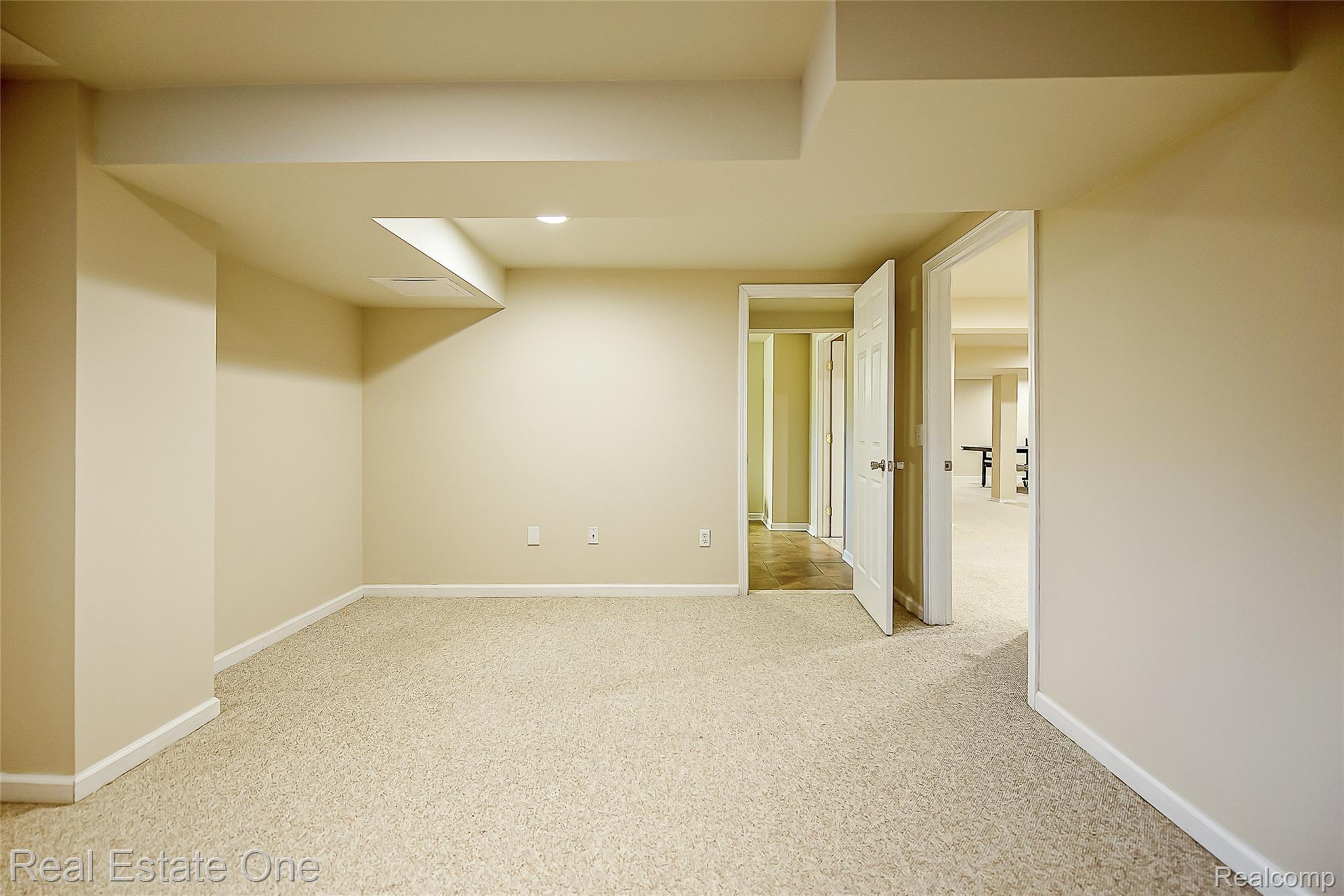 1013 Rochelle Park Drive Rochester, MI 48307 - Photo 51 of 74 Carpeted flooring, recessed lighting, neutral wall tones, and multiple entryways