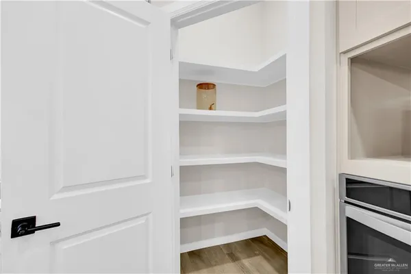 a view of an empty walk in closet