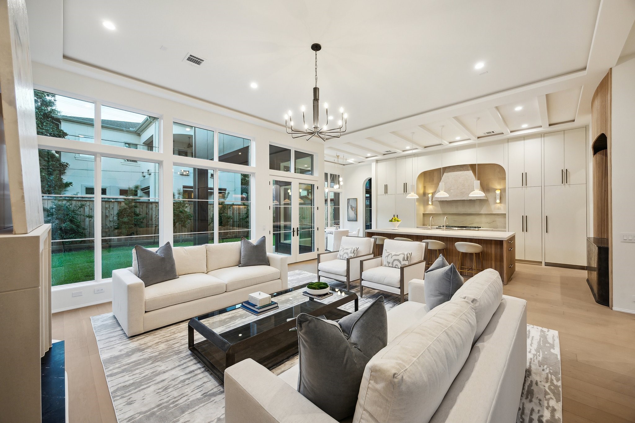 1656 Banks Street Houston, TX 77006 - Photo 31 of 31 a living room with furniture and a chandelier