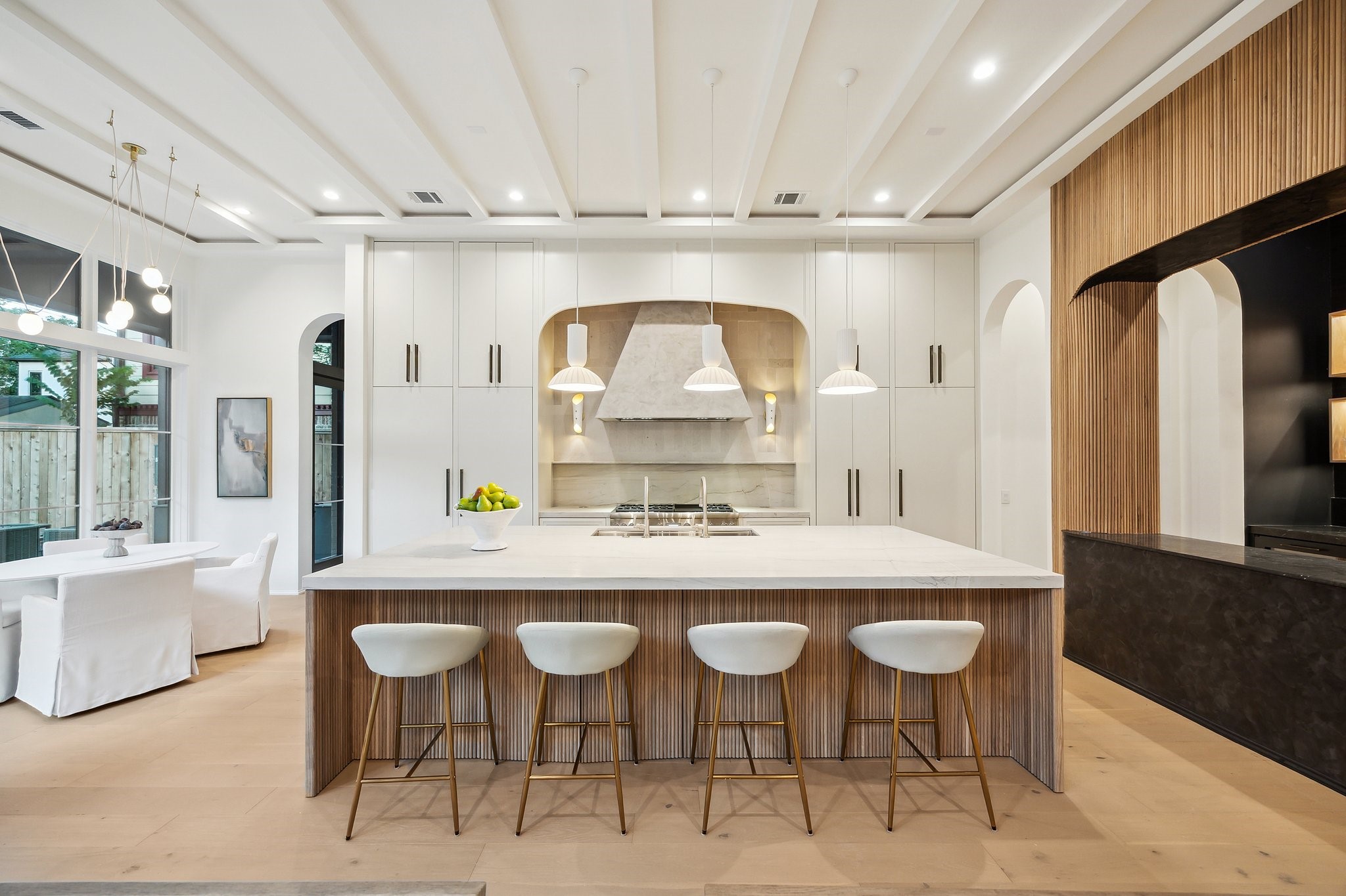 1656 Banks Street Houston, TX 77006 - Photo 14 of 31 a kitchen with a dining table and chairs