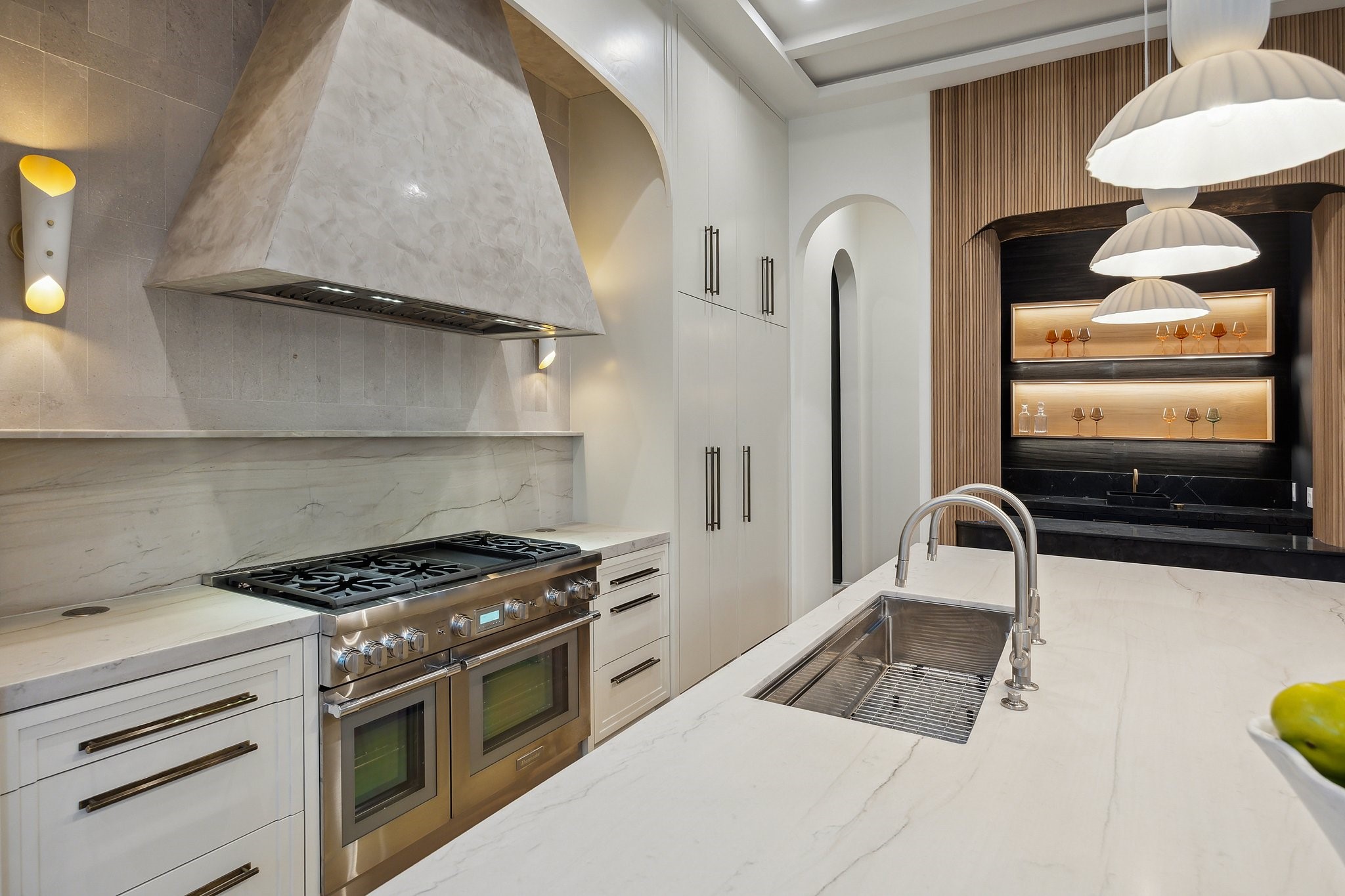 1656 Banks Street Houston, TX 77006 - Photo 15 of 31 a kitchen with a stove and a sink
