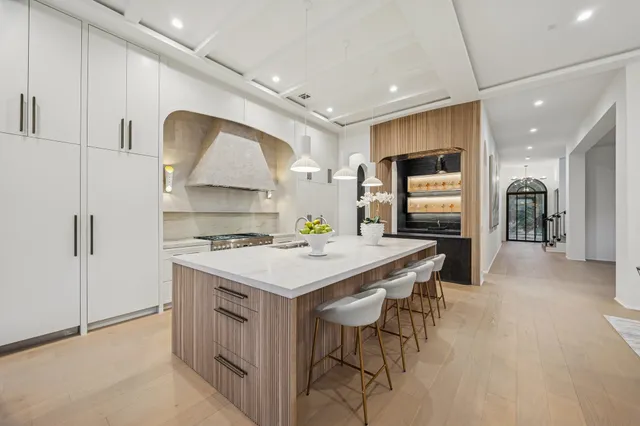 a kitchen with a stove and a sink