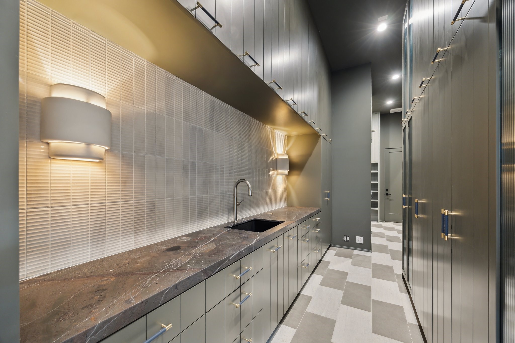 1656 Banks Street Houston, TX 77006 - Photo 18 of 31 a bathroom with a granite countertop sink a toilet and shower