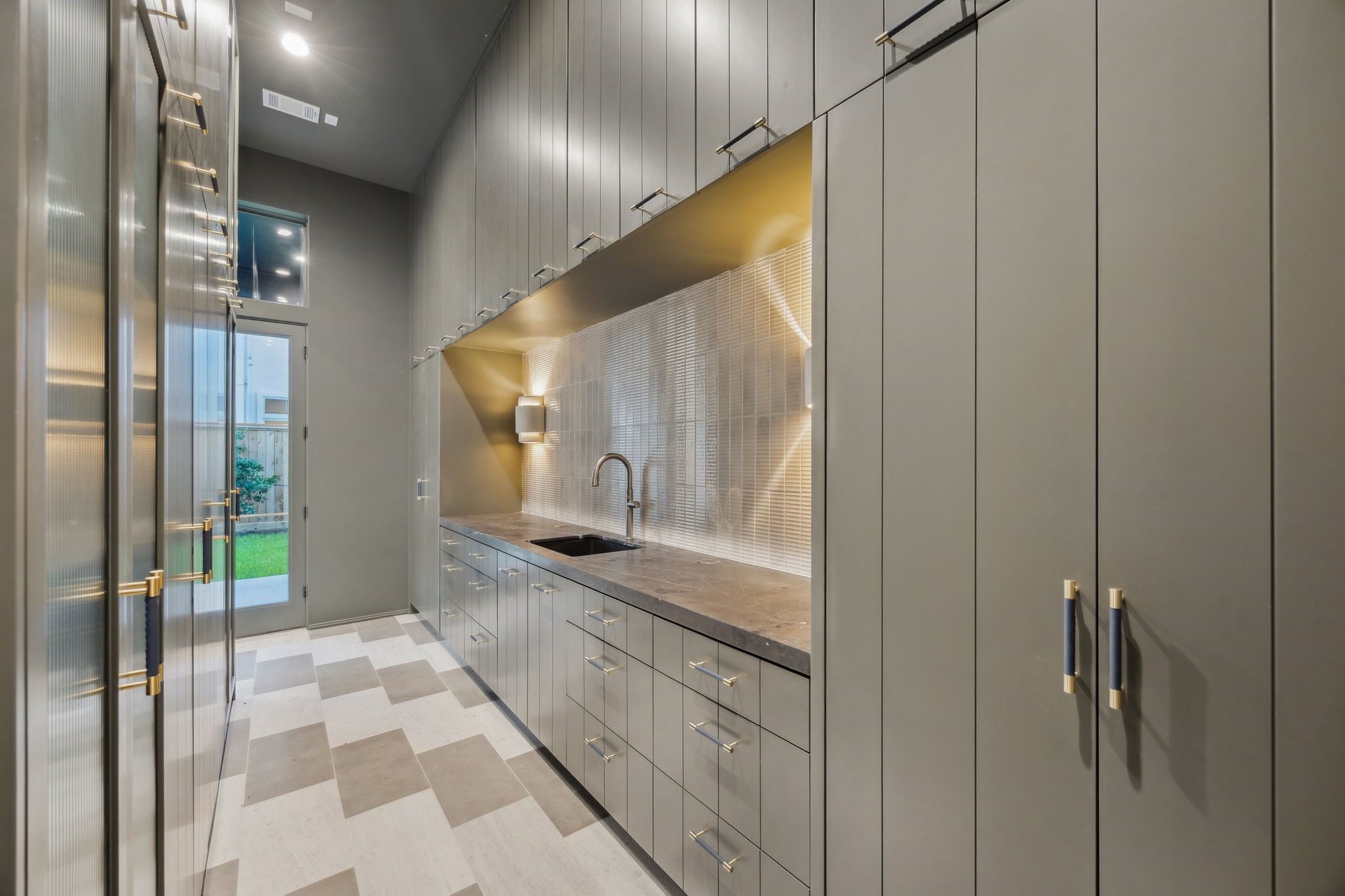 1656 Banks Street Houston, TX 77006 - Photo 19 of 31 a bathroom with a granite countertop sink and a mirror