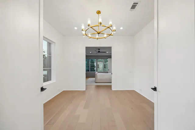 a view of a living room with a chandelier