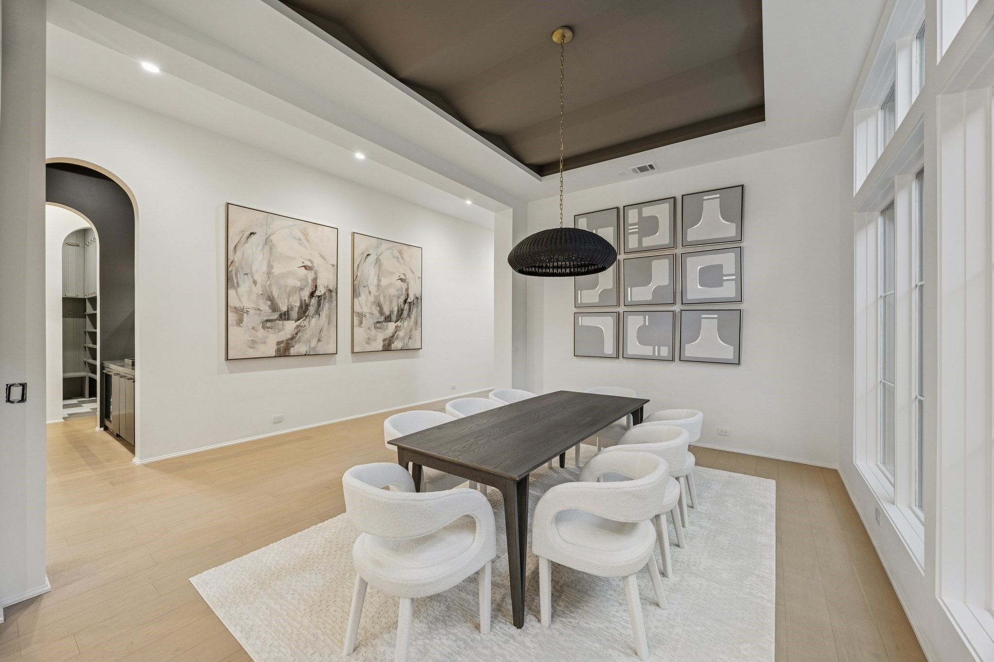 1656 Banks Street Houston, TX 77006 - Photo 9 of 31 a dinning room with stainless steel appliances kitchen island a table and chairs