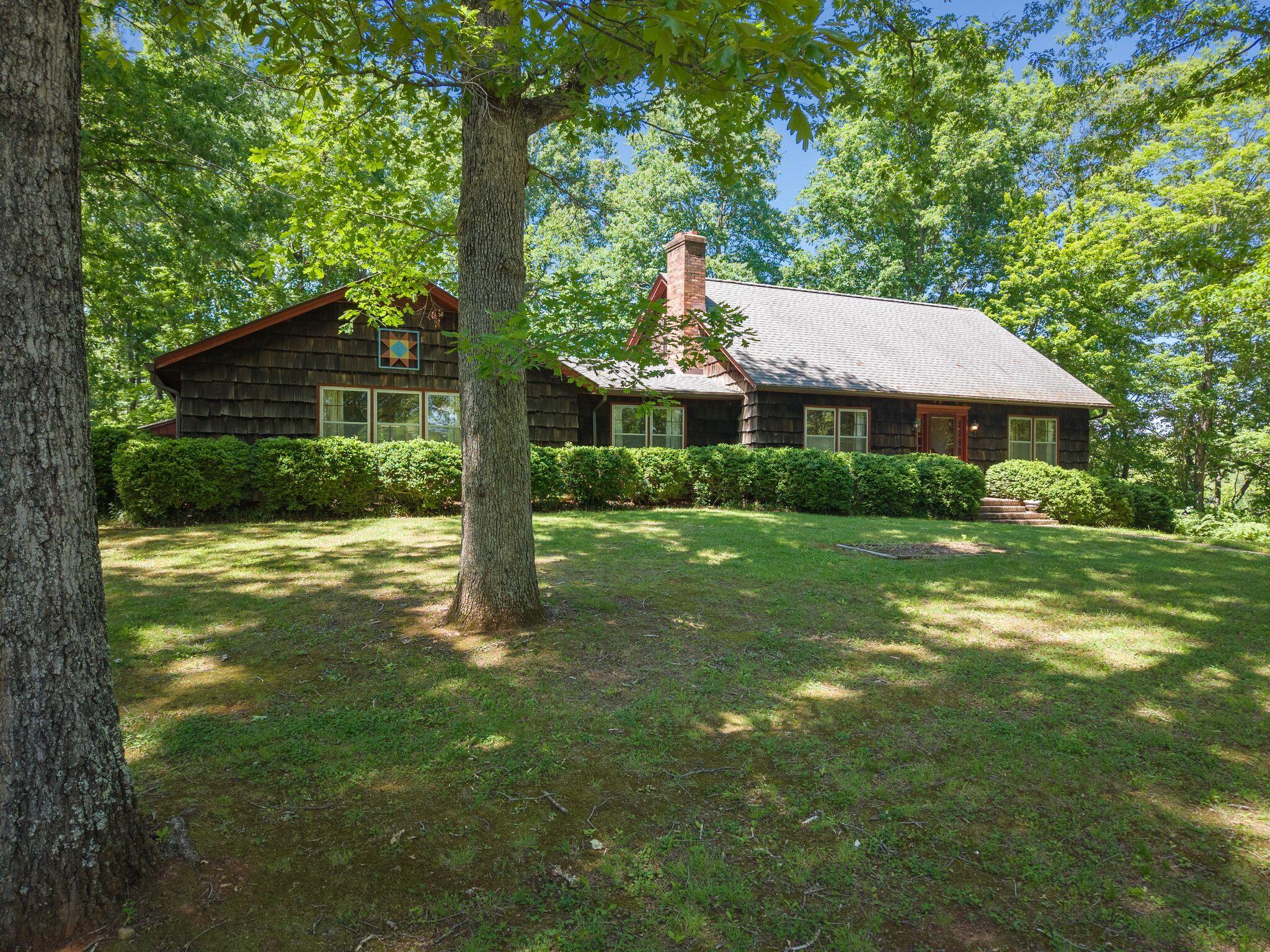 1115 Robin Ridge Road Henry, VA 24102 - Photo 31 of 54 a front view of a house with yard