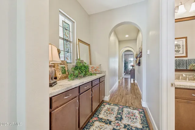 a view of a backyard with sitting area