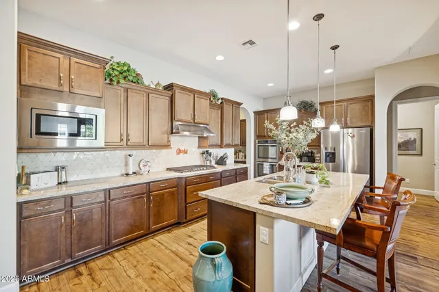 a view of a kitchen and dining room