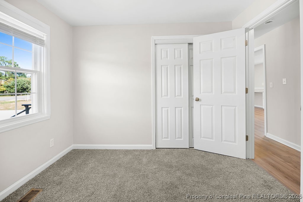 4066 Hummingbird Place Fayetteville, NC 28312 - Photo 16 of 30 a view of an empty room with a window