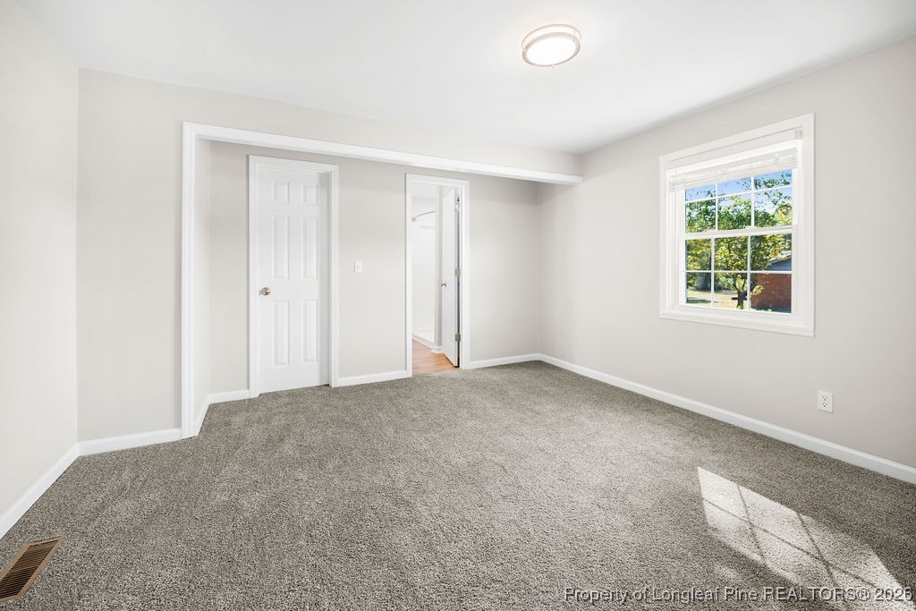 4066 Hummingbird Place Fayetteville, NC 28312 - Photo 22 of 30 a view of an empty room with a window