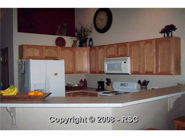 12416 Snaffle Bit Road Peyton, CO 80831 - Photo 5 of 14