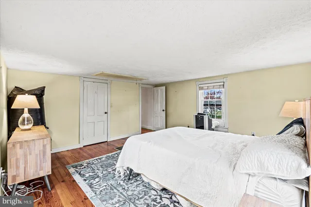 a bathroom with a sink and a window