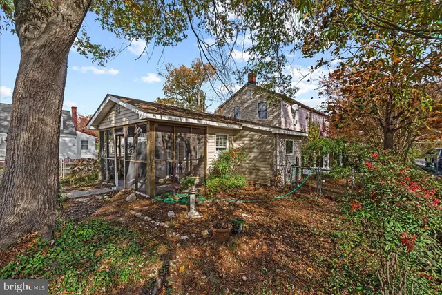 a house view with a backyard space