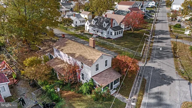 an aerial view of a house with a garden