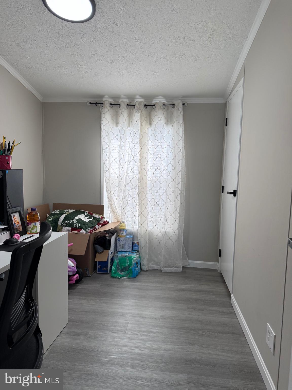 7959 Telegraph Road Severn, MD 21144 - Photo 7 of 18 a view of a workspace with furniture and a window