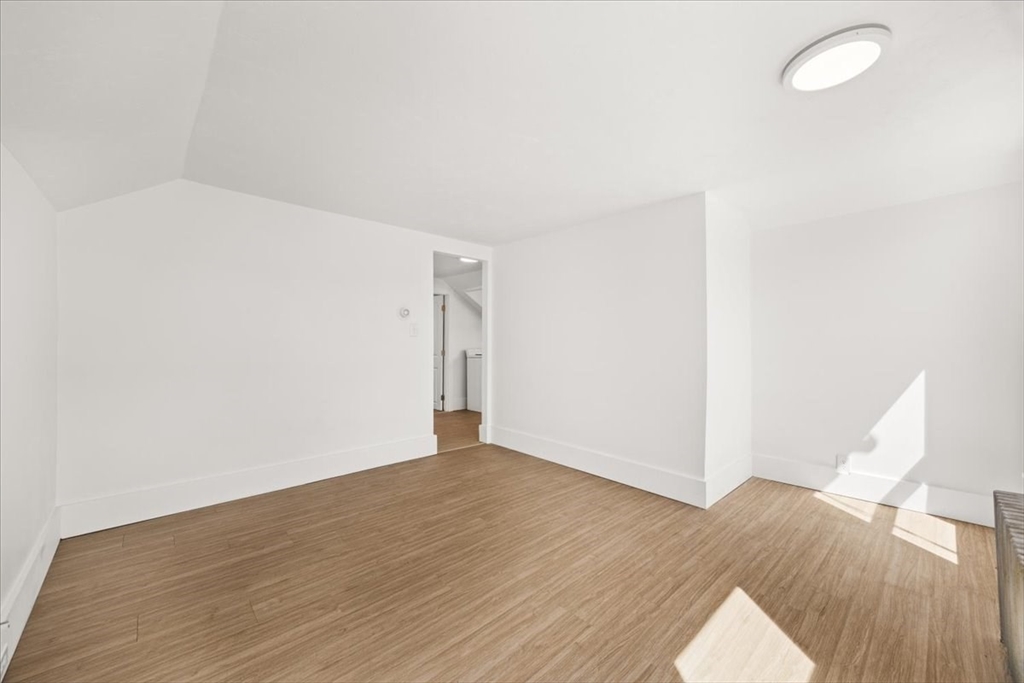 8 Herring Pond Road Bourne, MA 02532 - Photo 30 of 42 a view of an empty room with wooden floor