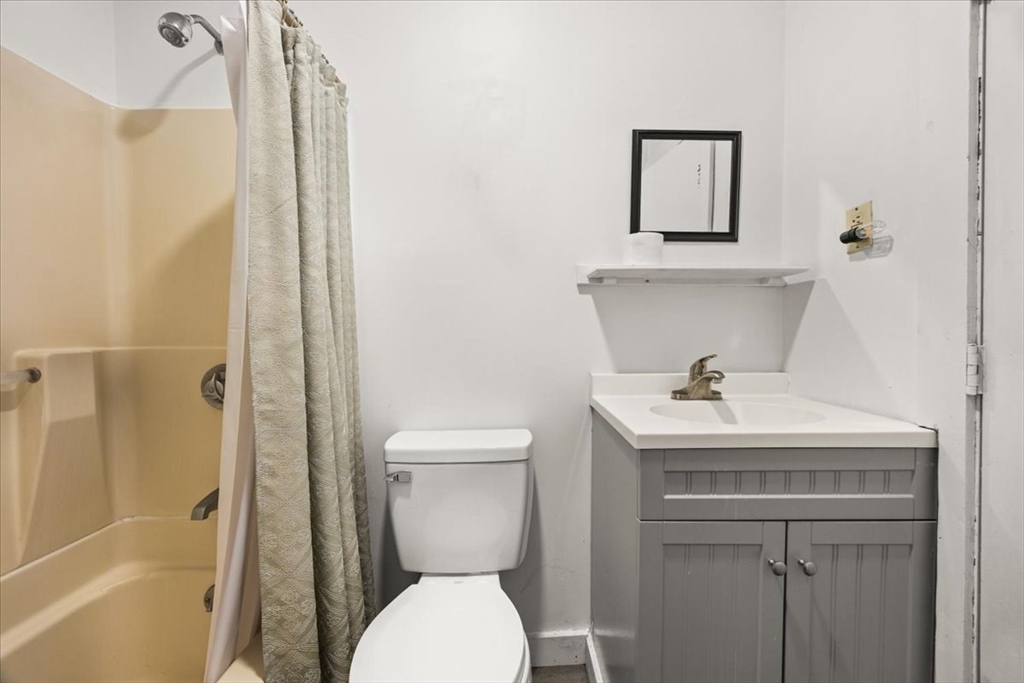 8 Herring Pond Road Bourne, MA 02532 - Photo 35 of 42 a bathroom with a sink a toilet and shower