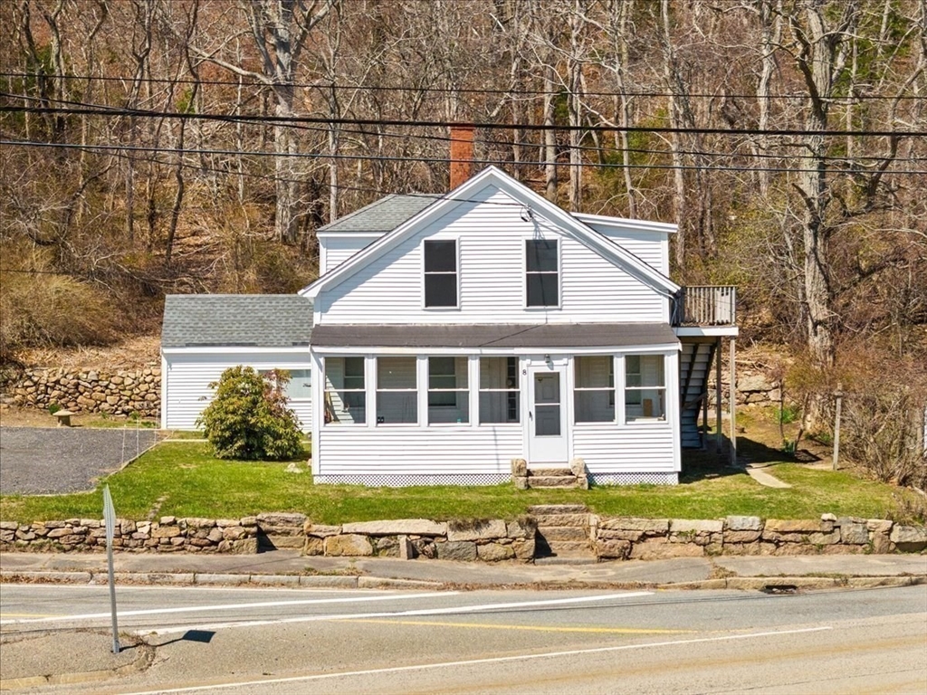 8 Herring Pond Road Bourne, MA 02532 - Photo 8 of 42 front view of a house and a yard