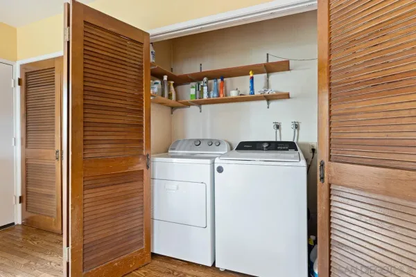 a utility room with dryer and washer