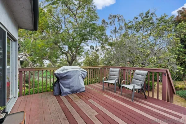 a view of roof deck with patio