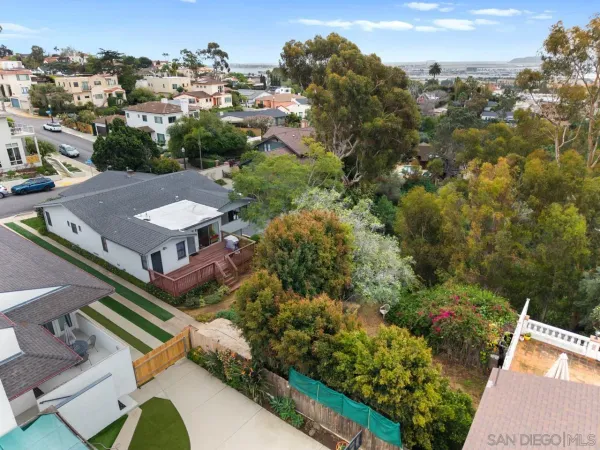 an aerial view of a house with a garden