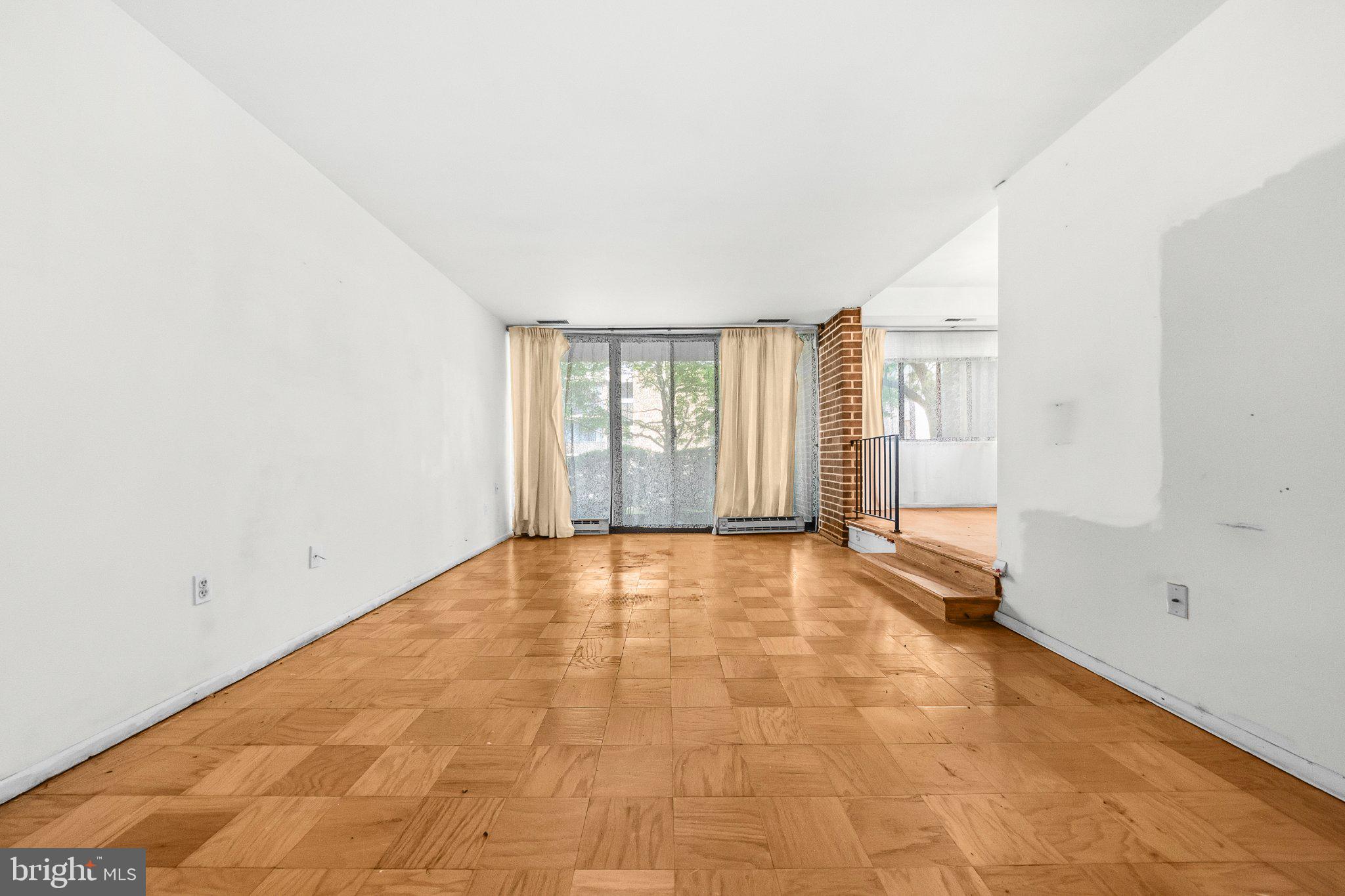 2103 Walsh View Terrace, Unit 102 Silver Spring, MD 20902 - Photo 7 of 30 Spacious room with natural light.