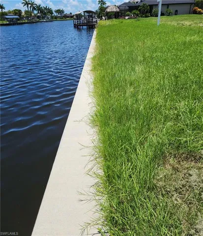 a view of swimming pool from a lake