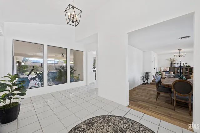 a view of a livingroom with furniture and front door