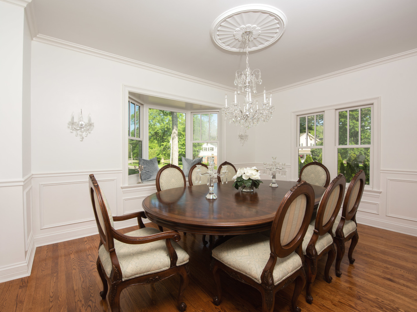 1050 Griffith Road Lake Forest, IL 60045 - Photo 5 of 40 a view of a dining room with furniture window and wooden floor