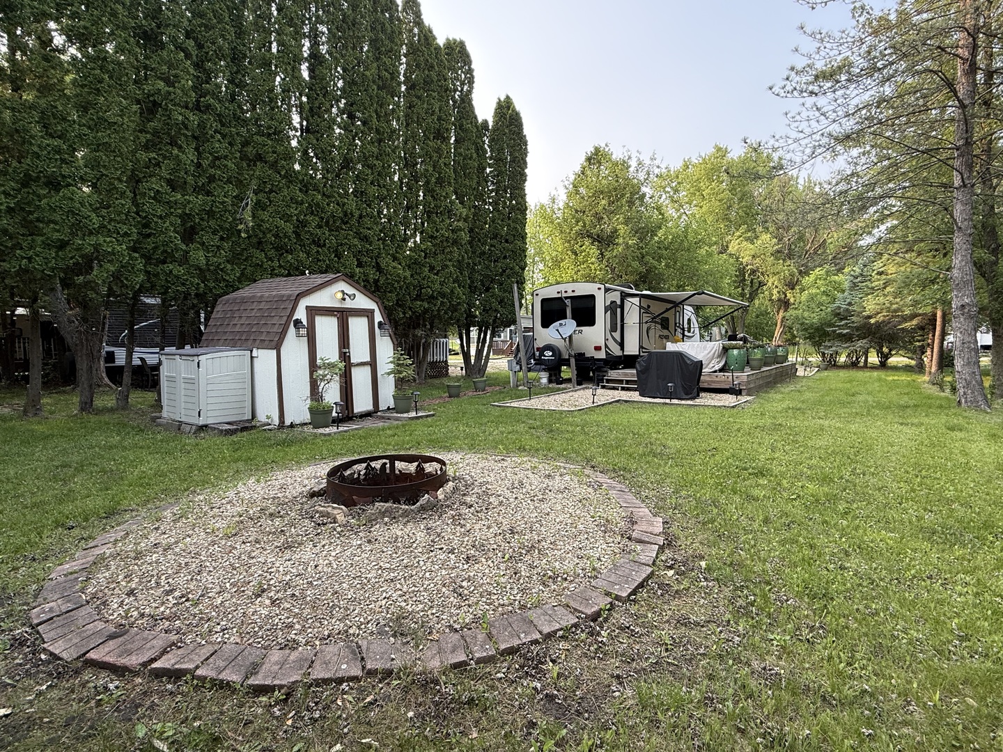 28-27 Woodhaven Lakes Sublette, IL 61367 - Photo 19 of 21 a front view of a house with garden