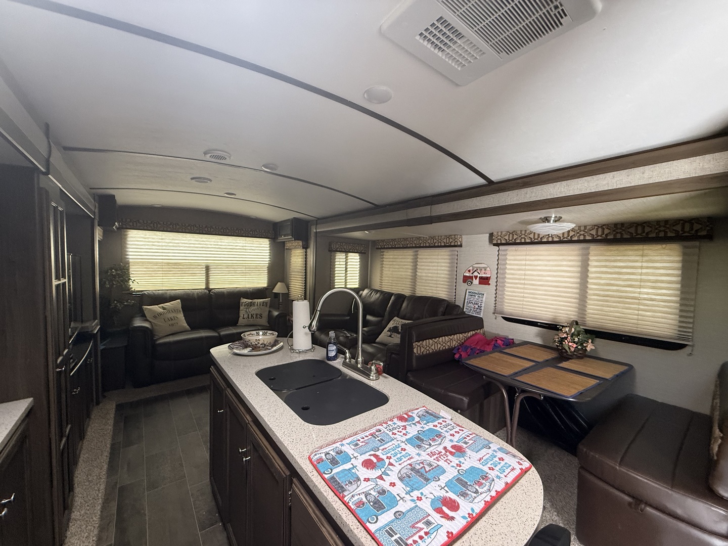 28-27 Woodhaven Lakes Sublette, IL 61367 - Photo 9 of 21 a kitchen with kitchen island granite countertop a sink stove and cabinets