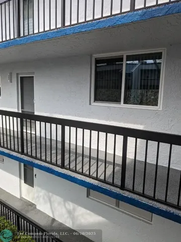 a balcony view with an outdoor space