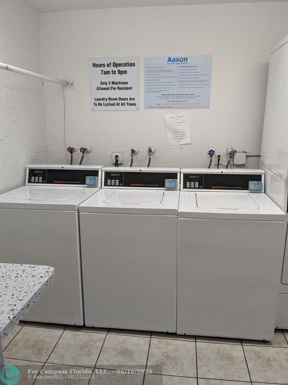 3130 Holiday Springs Boulevard, Unit 204 Margate, FL 33063 - Photo 24 of 32 a utility room with washer and dryer