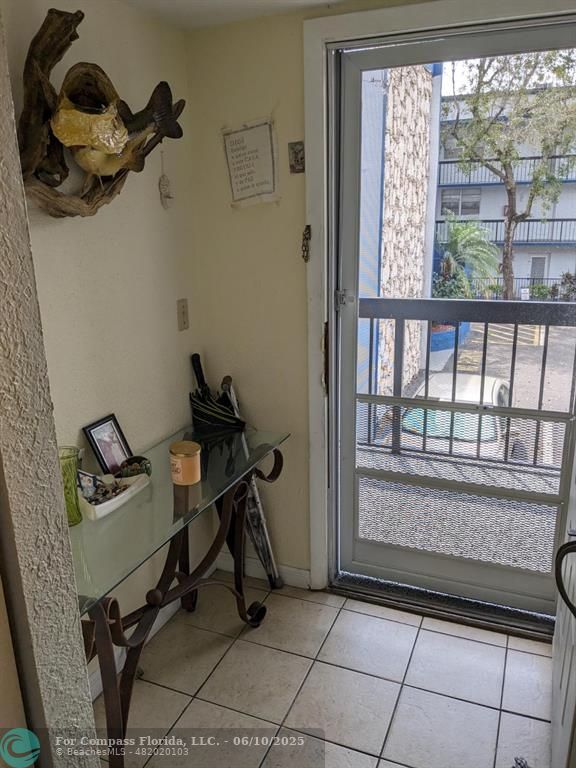 3130 Holiday Springs Boulevard, Unit 204 Margate, FL 33063 - Photo 3 of 32 a room with storage and utility