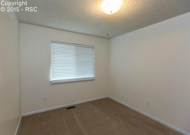 6620 Turkey Tracks Road Colorado Springs, CO 80922 - Photo 22 of 36 Bedroom #4 on the upper level