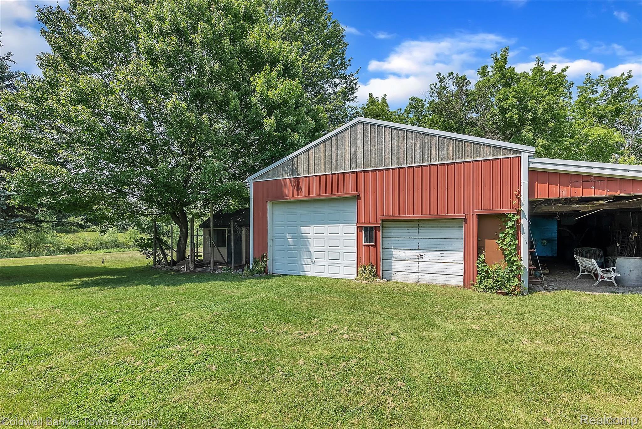 5431 Evans Road Holly, MI 48442 - Photo 62 of 81 Large Pole Barn with electricity. Great for a mechanic, animals, or additional storage