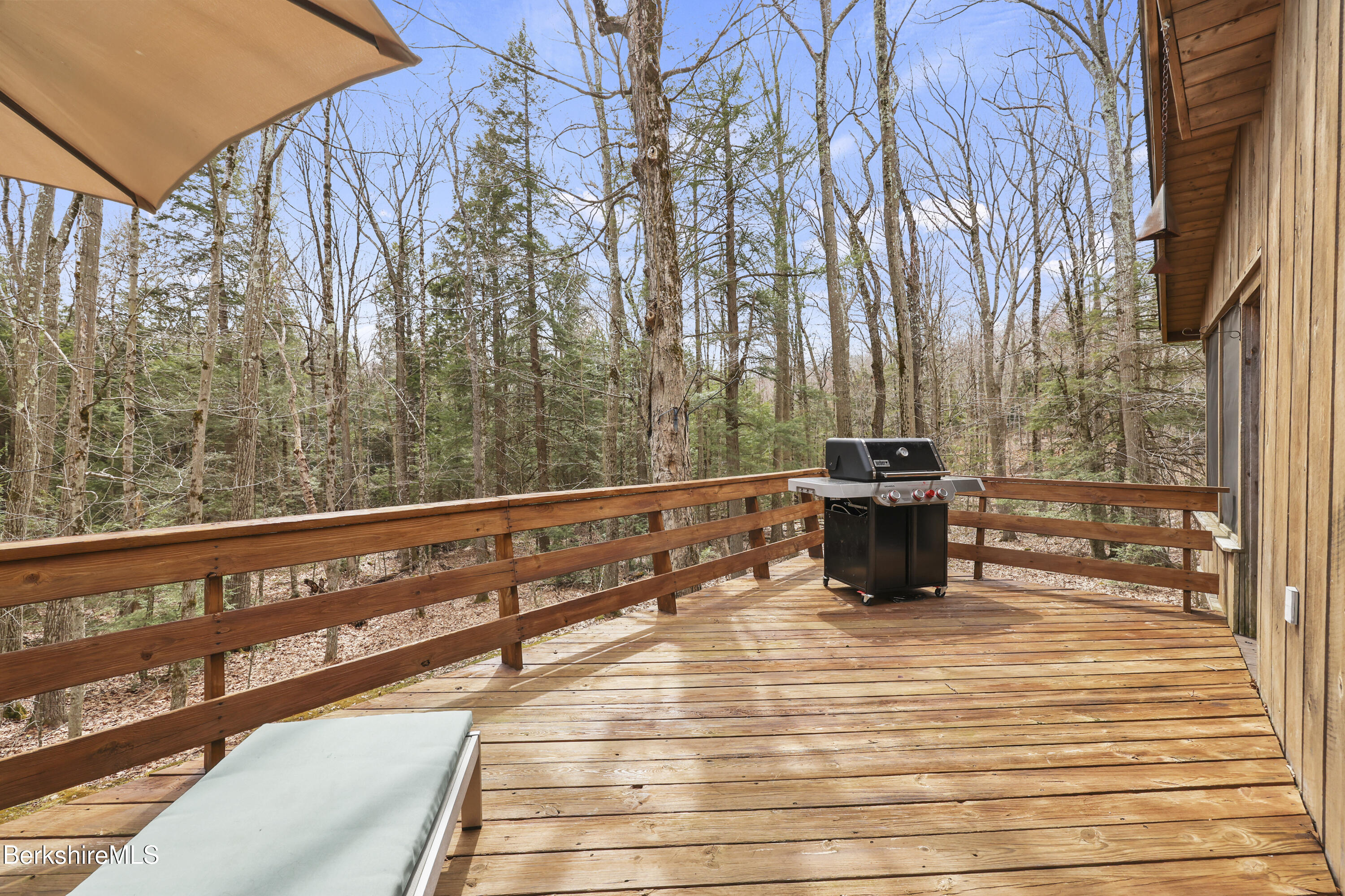 125 Town Hill Road Sandisfield, MA 01255 - Photo 16 of 42 a view of roof deck with chairs and wooden fence