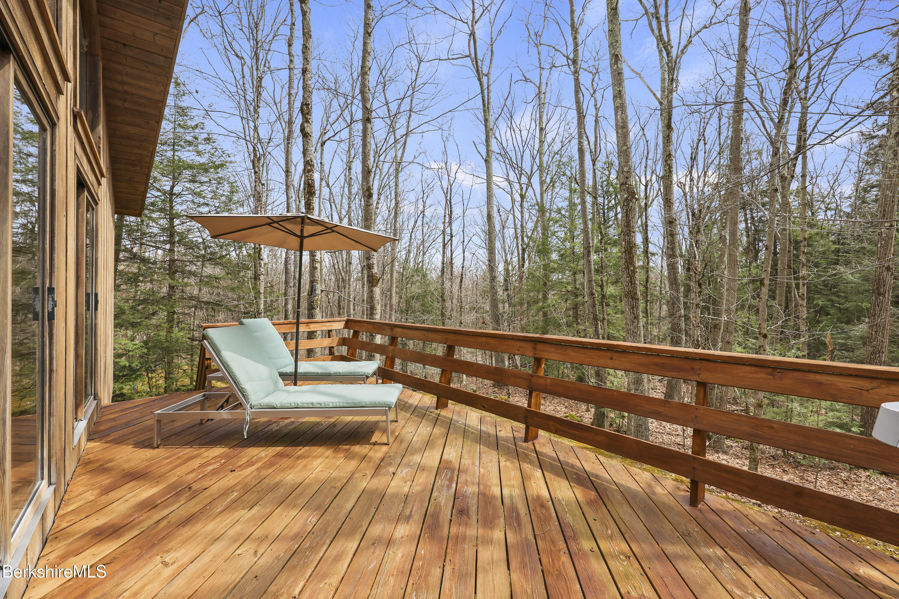 125 Town Hill Road Sandisfield, MA 01255 - Photo 17 of 42 a view of a chairs and tables in the balcony