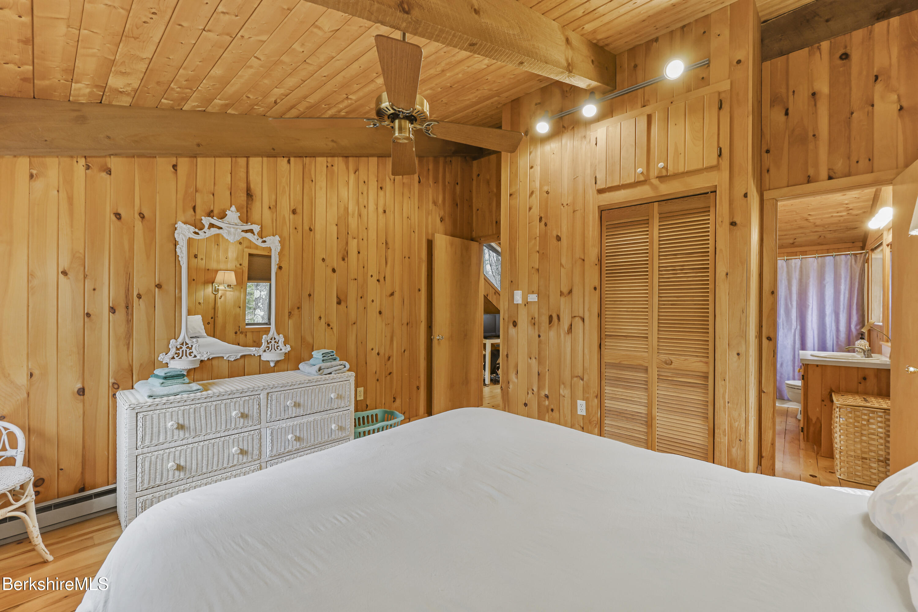 125 Town Hill Road Sandisfield, MA 01255 - Photo 20 of 42 a bedroom with a bed and a closet