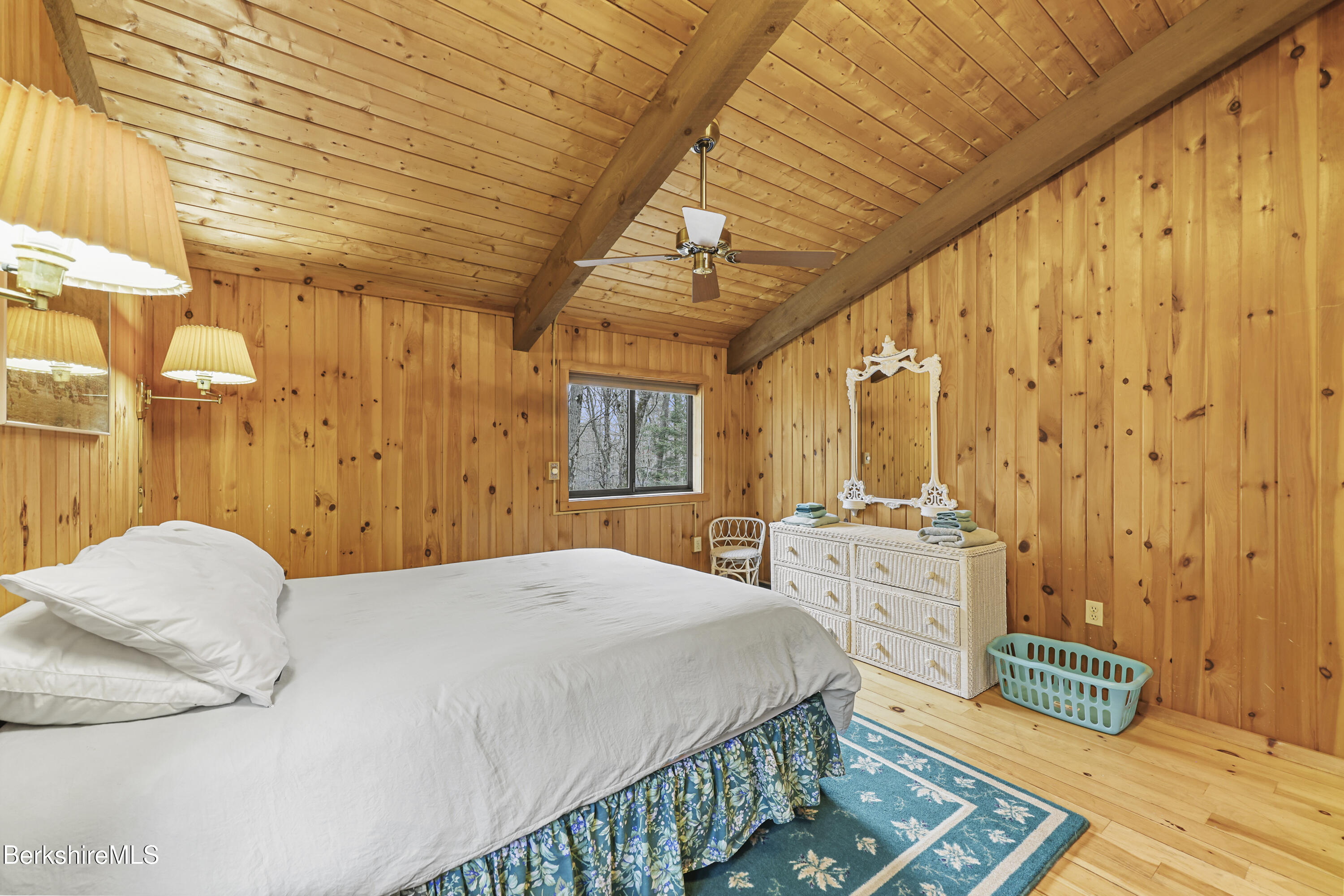 125 Town Hill Road Sandisfield, MA 01255 - Photo 24 of 42 a bedroom with a bed and a dresser