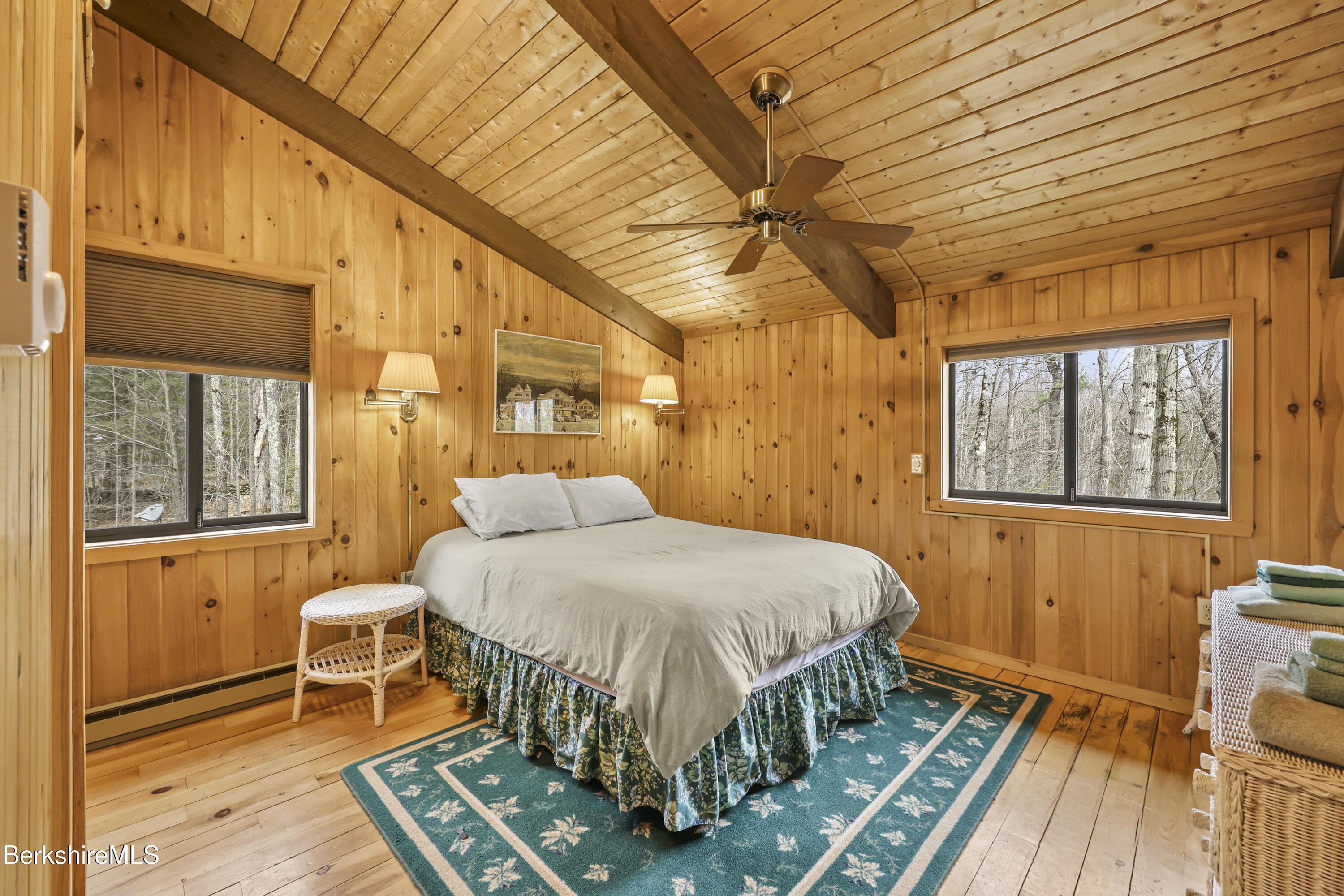 125 Town Hill Road Sandisfield, MA 01255 - Photo 25 of 42 a bed sitting in a bedroom next to a window