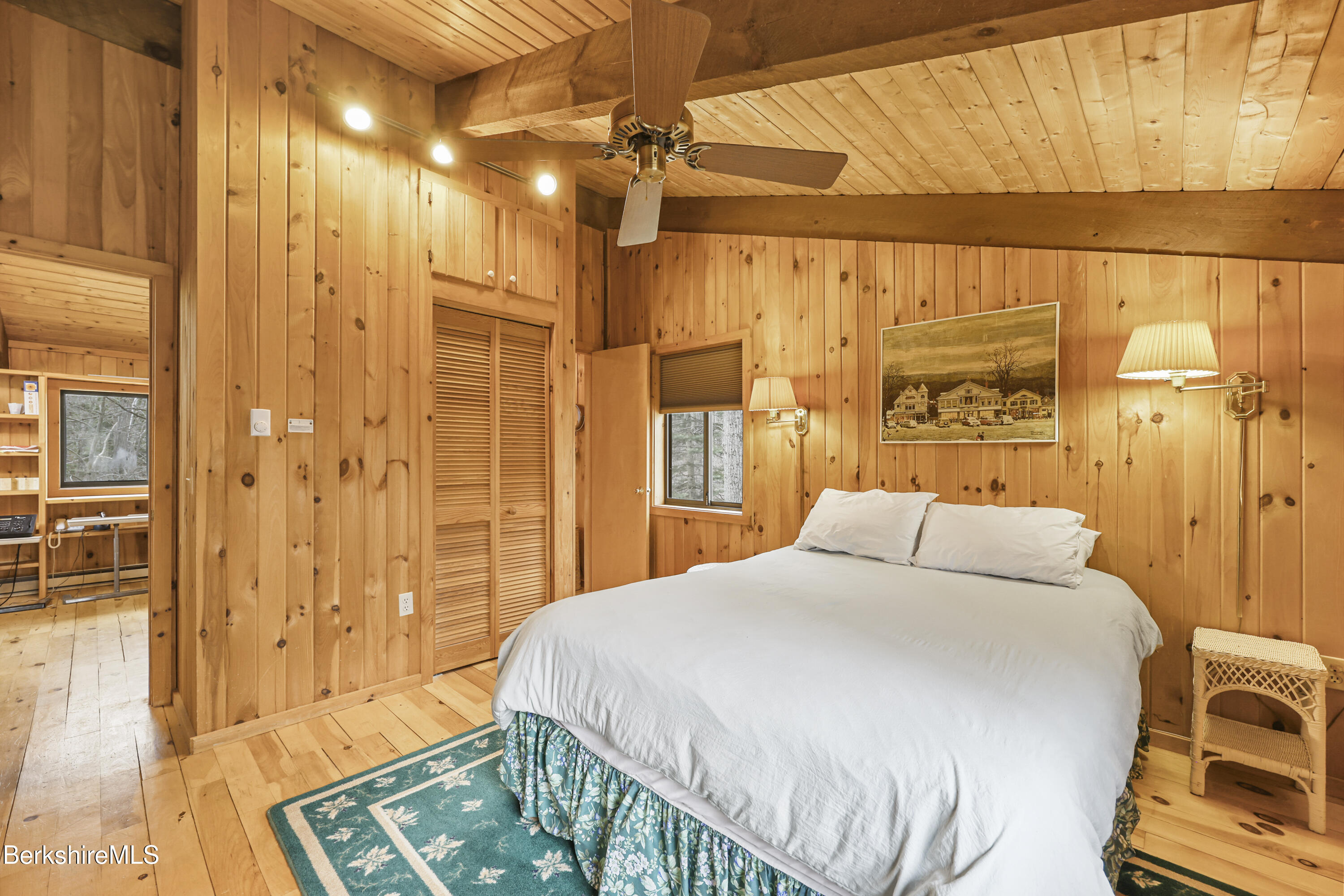 125 Town Hill Road Sandisfield, MA 01255 - Photo 26 of 42 a bedroom with a bed and a mirror