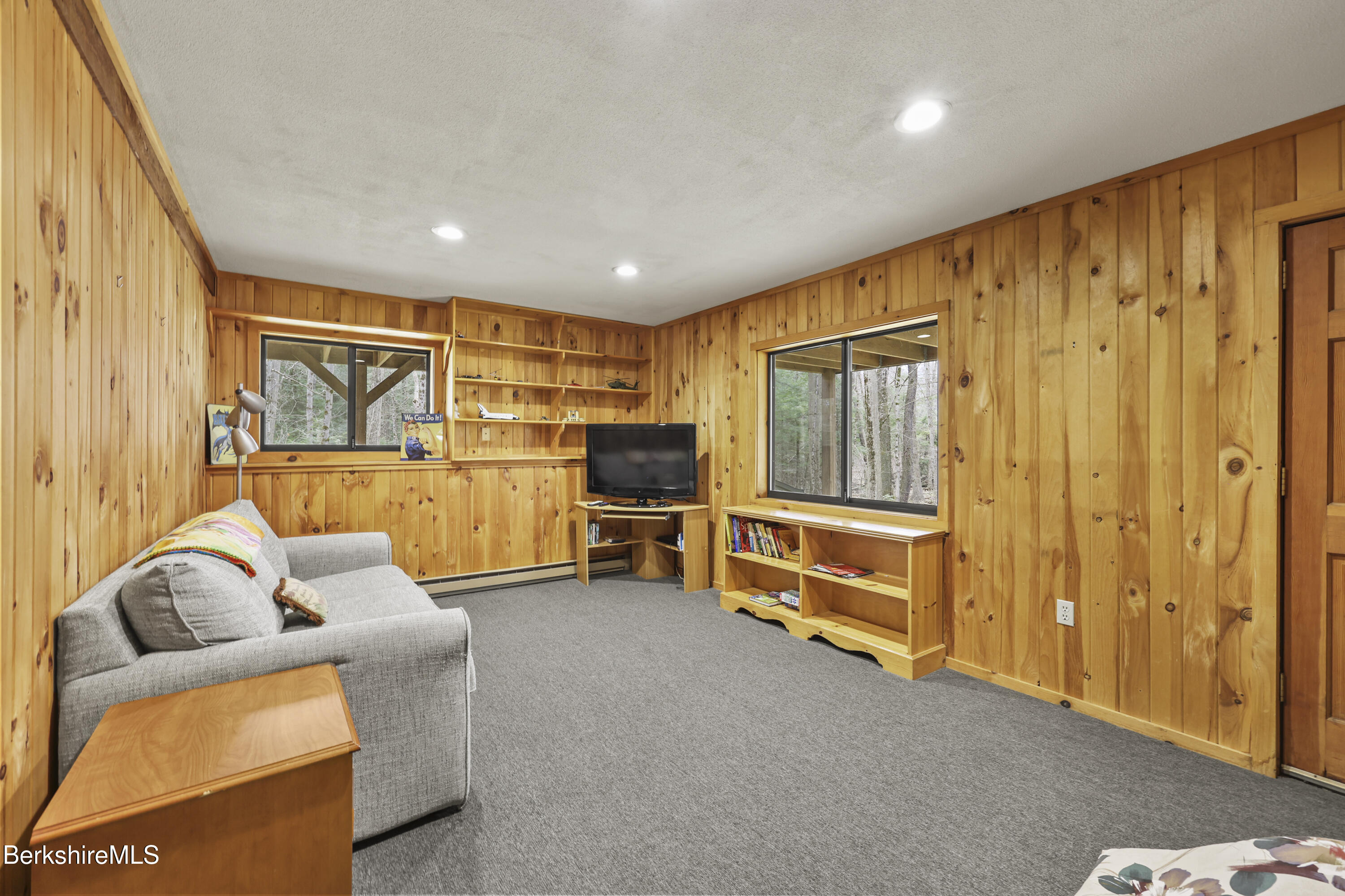 125 Town Hill Road Sandisfield, MA 01255 - Photo 28 of 42 a living room with furniture a ceiling fan and a window